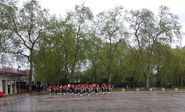 Band of the Royal Regiment of Scotland return in the rain to Wellington Barracks
